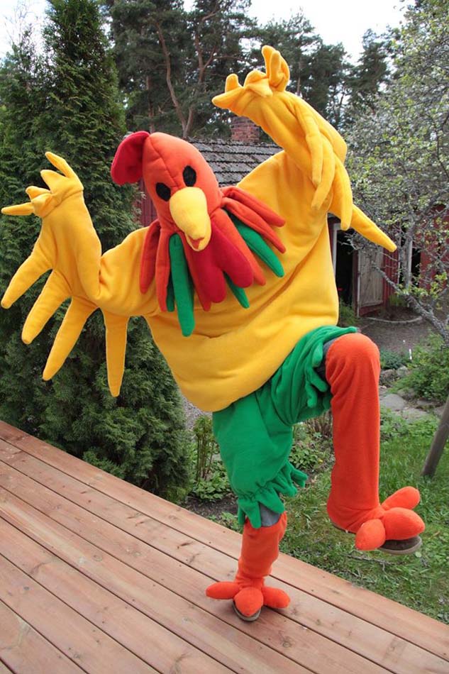 a chicken mascot dancing 